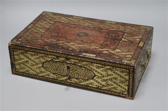A Chinese export lacquer artists box, containing ceramic dishes